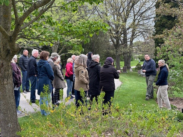 People gathered at Woodlawn Memorial Park.